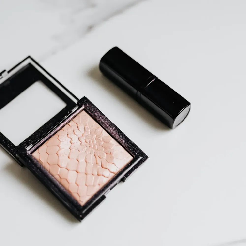 Iluminador compacto champagne